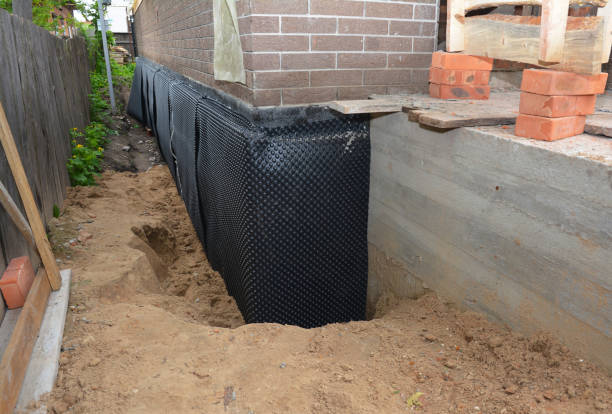 SJ Waterproofing Pros technician performing targeted Waterproofing assessment in Frankewing, TN